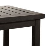 Detailed close-up on slatted top with emphasis on textured finish and joinery
