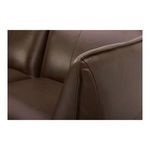 Close-up focus on smooth corner stitching and rounded backrest edge of sectional