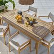 Top-down view of outdoor dining table with six Chesapeake Arm Chairs on an outdoor rug