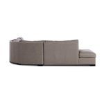 Side profile showcasing curved back design and minimalist armrest of the sectional