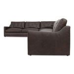 Side view showing sloped arm and tufted back cushions in rich espresso leather