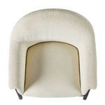 Top down view focusing on seat bucket shape and soft boucle fabric texture