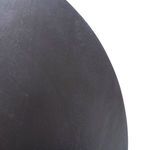 Close-up on the circular tabletop surface showing the dark, softly textured wood grain finish