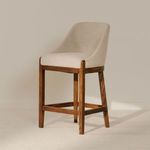 Edward stool staged in a neutral room setting casting soft shadow on a light floor