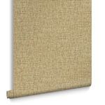 Rolled wallpaper sheet showing the textured woven pattern and muted golden color