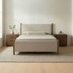 Warren Bed styled in bedroom with wooden floors, side tables, light rug, and neutral decor
