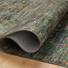 Curled corner revealing soft, flexible polyester texture and backing