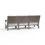 Rear view of Laguna Sofa showing slatted driftwood-finish aluminum back and frame