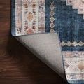 Rug corner flipped to display durable woven backing and neatly finished edges