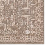 Close-up of a corner showing detailed motifs and color gradient in taupe and cream shades