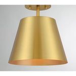 close-up side angle showing brushed texture of natural brass shade