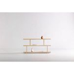 Miri Small Shelf styled as room divider with decorative vases and books in a minimal white room