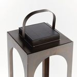 Top view highlighting square solar panel and arched frame edges with bronze finish