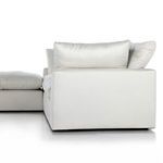 Left side view showing armrest proportions and feather-blend back cushions