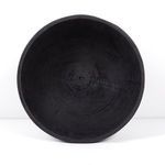 Top-down view revealing circular wood grain pattern and subtle cracks inside turned pedestal bowl