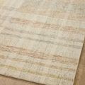 Overhead angled view of Chris Natural Multi rug showing muted orange and beige stripe pattern