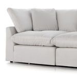 Close-up on left armrest and seat cushions with visible seam detailing