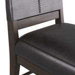 Close-up angled view of back panel highlight with grey leather and decorative stitching detail