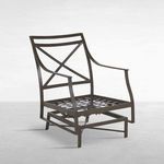 Chair frame without cushions showing aluminum lattice seat and X-back design