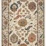 Padma White / Multi Rug with intricate floral and leaf motifs in muted earth tones on a cream background