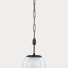 Pendant light viewed from below, emphasizing round shade and chain suspension