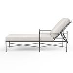 Side profile of Provence Chaise Lounge highlighting bowed armrest and frame with white cushions
