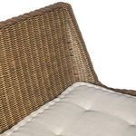 Extreme close-up of edge detailing on the cushion and joint area of woven rattan frame
