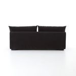 Rear view of Grant sectional piece showing clean lines and fabric upholstery wrapping the back
