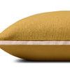 side profile view showing the pillow’s thickness and smooth beige flange edges