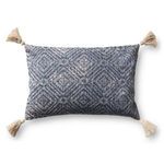 Rectangular blue pillow with geometric pattern and cream tassels on each corner, textured cotton fabric