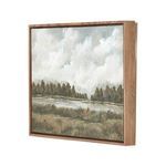 Side angle showing the depth of the wood frame surrounding the landscape painting