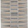 Rectangular geometric rug with mosaic pattern in tan and gray shades with fringe on short ends