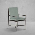 Outdoor Roma wrought aluminum arm chair with sleek black frame, gold accents, and muted green cushions