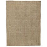 Chevron rug shown from a slightly angled top view highlighting its rectangular shape and subtle color variations