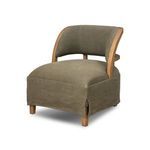 Three-quarter view highlighting curved open back and chunky oak wood frame of Dreya Chair