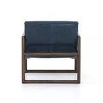Rear view highlighting smooth chalk-white upholstery and wood frame structure