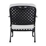 Repeat of rear straight-on view detailing black metal lattice backrest and white cushions