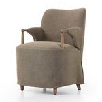Brently Dining Chair angled view showing oak arms and fabric draped over the skirted base