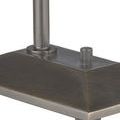 Close-up of metal base corner, showing finish and texture around knob attachment