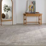 Sylvana Trellis rug in a bright room with wooden console table and artwork on the wall