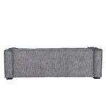 Back view of Eli sofa showing plain fabric with wide padded back and armrests