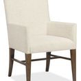 Driftwood Upholstered Arm Chair with neutral fabric seat and back, rustic burnished wood frame in Worn Saddle finish