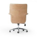 Rear view showing full back leather panel with stitching and adjustment lever on polished aluminum base