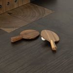 Playing surface decorative wood center piece with dark metal finish surrounding