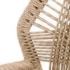 Close-up of tightly braided sand-colored rope outlining the chair’s upper arm and backrest
