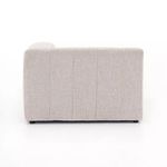 Back view with vertical channels fully visible on low-profile sandstone sectional