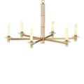 angled view of lit Marcelo chandelier highlighting warm glow from frosted glass shades