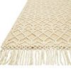 Close-up of Noelle Ivory Gold Rug showing knotted fringe and intricate textured pattern