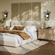 Pair of Rochefort Wall Sconces mounted over nightstands in warmly sunlit beige bedroom