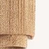 Close-up of Metuchen Wall Sconce bottom layered shade wrapped in tightly woven Abaca cord texture